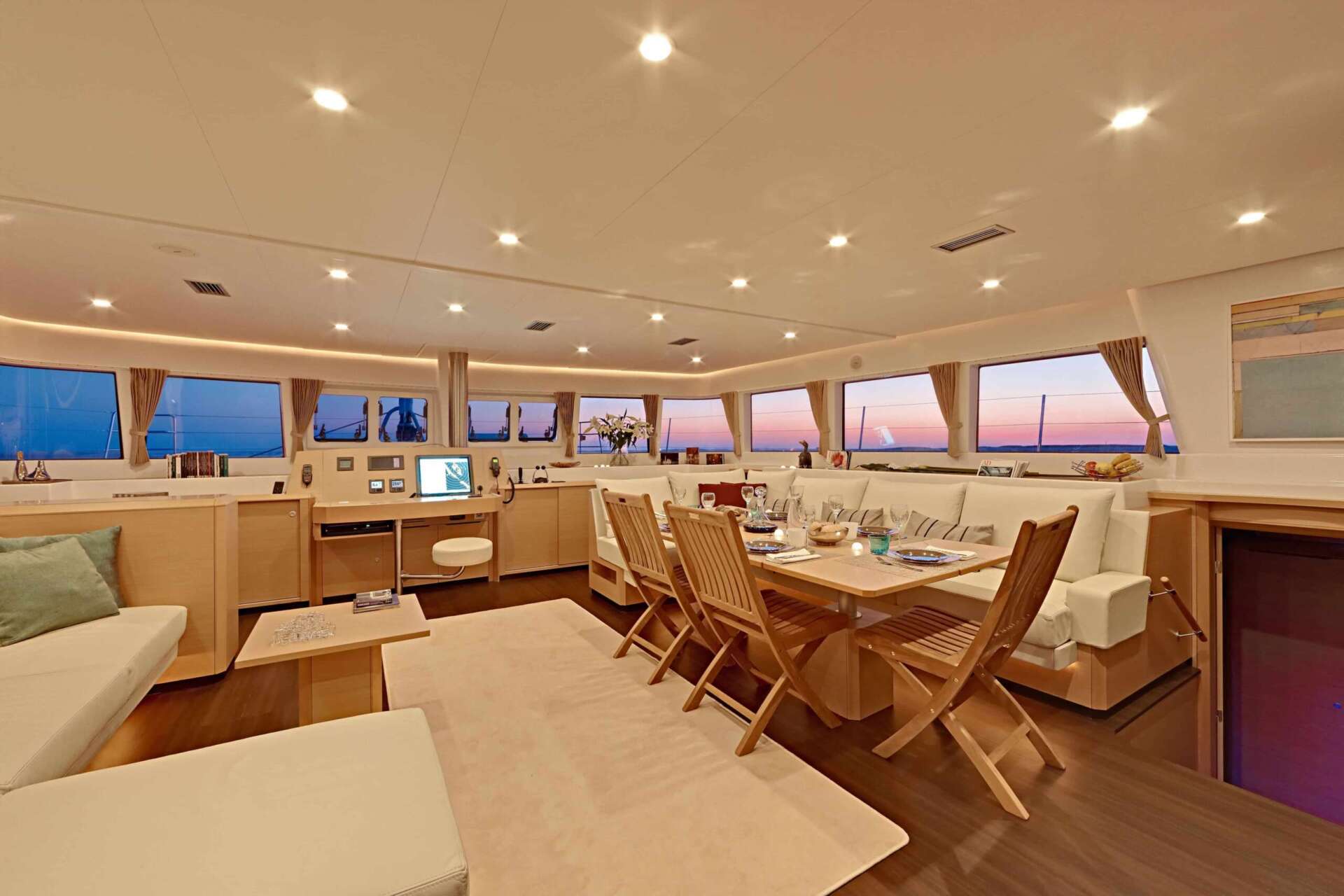 Bright salon interior of the Lagoon 620 luxury catamaran