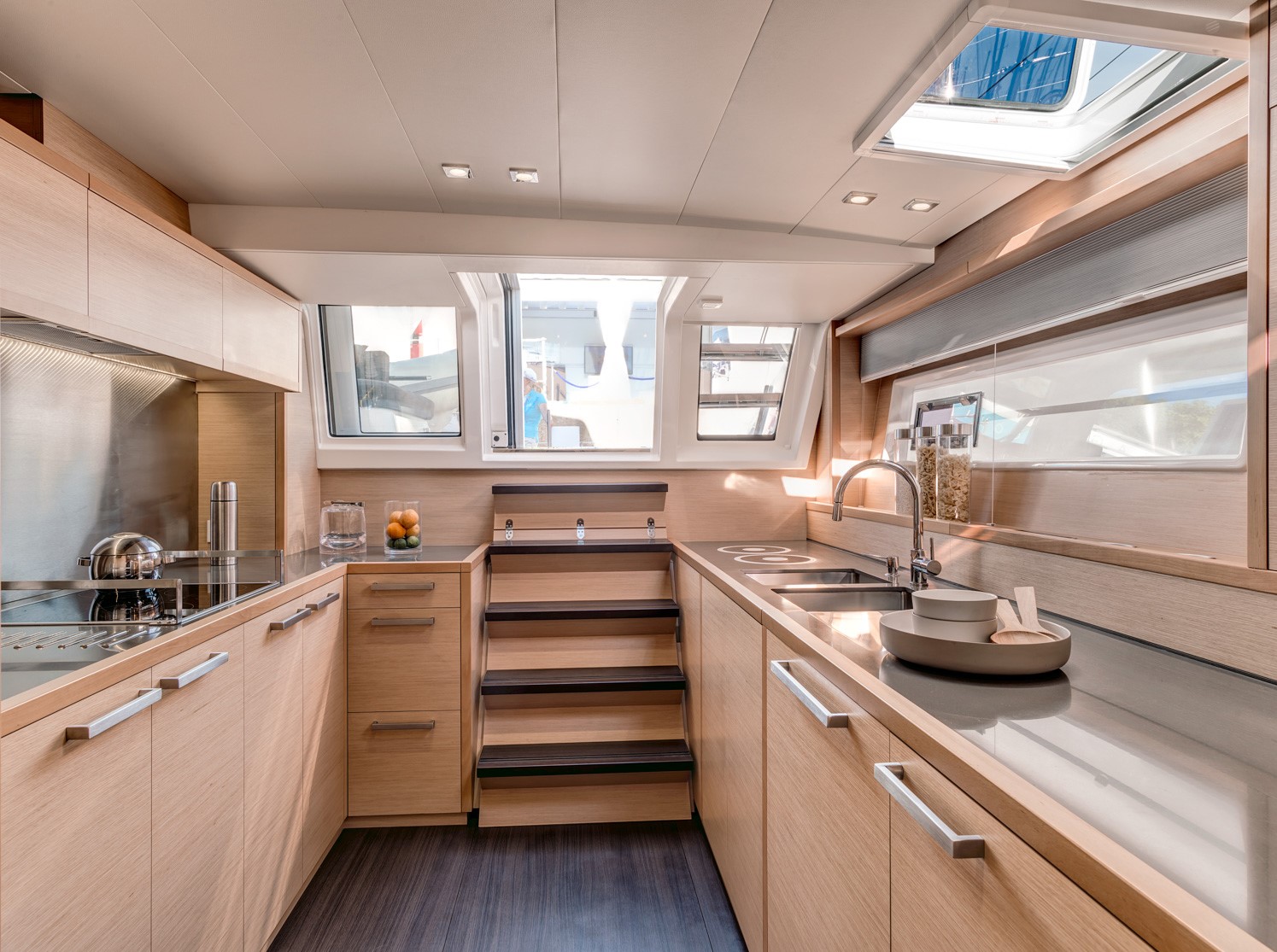 Bright salon interior of the Lagoon 620 luxury catamaran