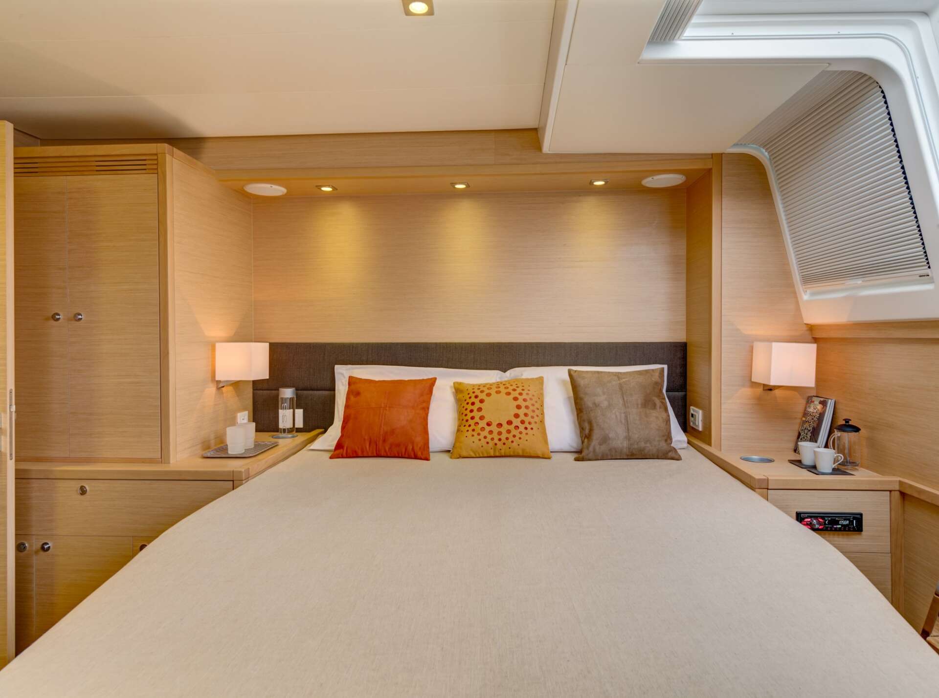 Bright salon interior of the Lagoon 620 luxury catamaran
