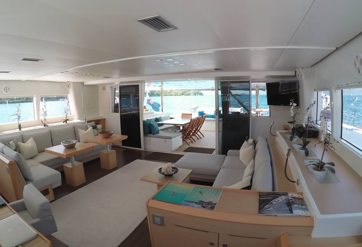 Bright salon interior of the Lagoon 620 luxury catamaran