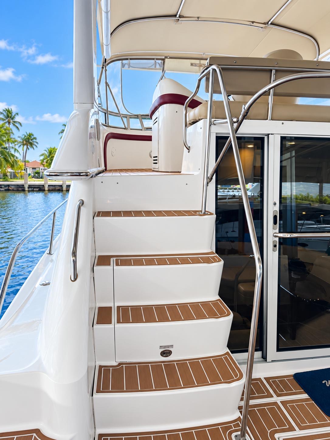 YOLO8 50 ft flybridge yacht available for private yacht charters in Miami, Florida, cruising Biscayne Bay.
