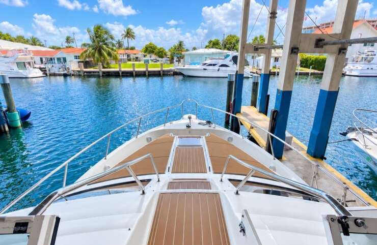 YOLO8 50 ft flybridge yacht available for private yacht charters in Miami, Florida, cruising Biscayne Bay.