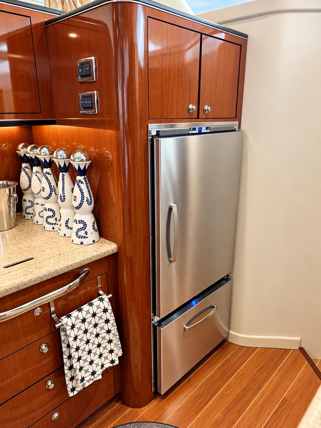 YOLO8 50 ft flybridge yacht available for private yacht charters in Miami, Florida, cruising Biscayne Bay.
