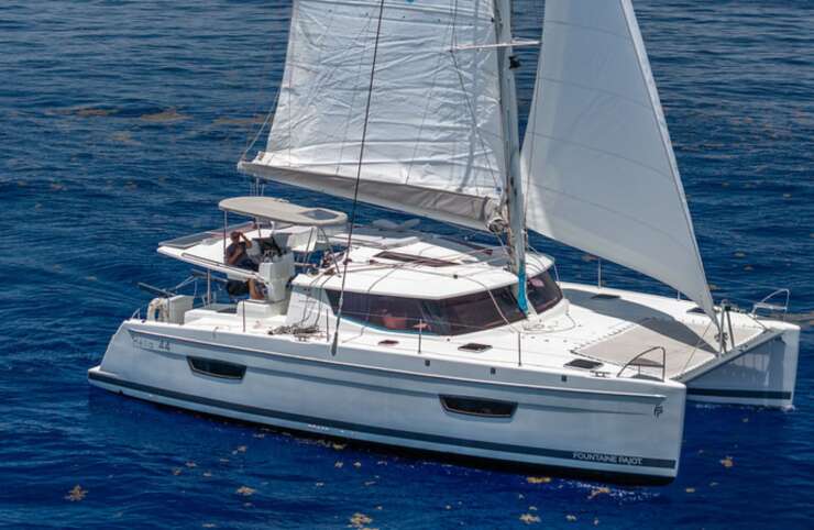Fountaine Pajot 44ft luxury catamaran for charter in the Bahamas, accommodating 8 guests in 4 cabins.